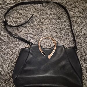 Elegant Black Handbag with Gold Accent